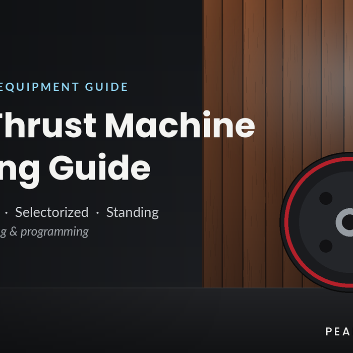 Hip thrust machine buying guide with weight plates in a home gym - Peak Flow Fitness