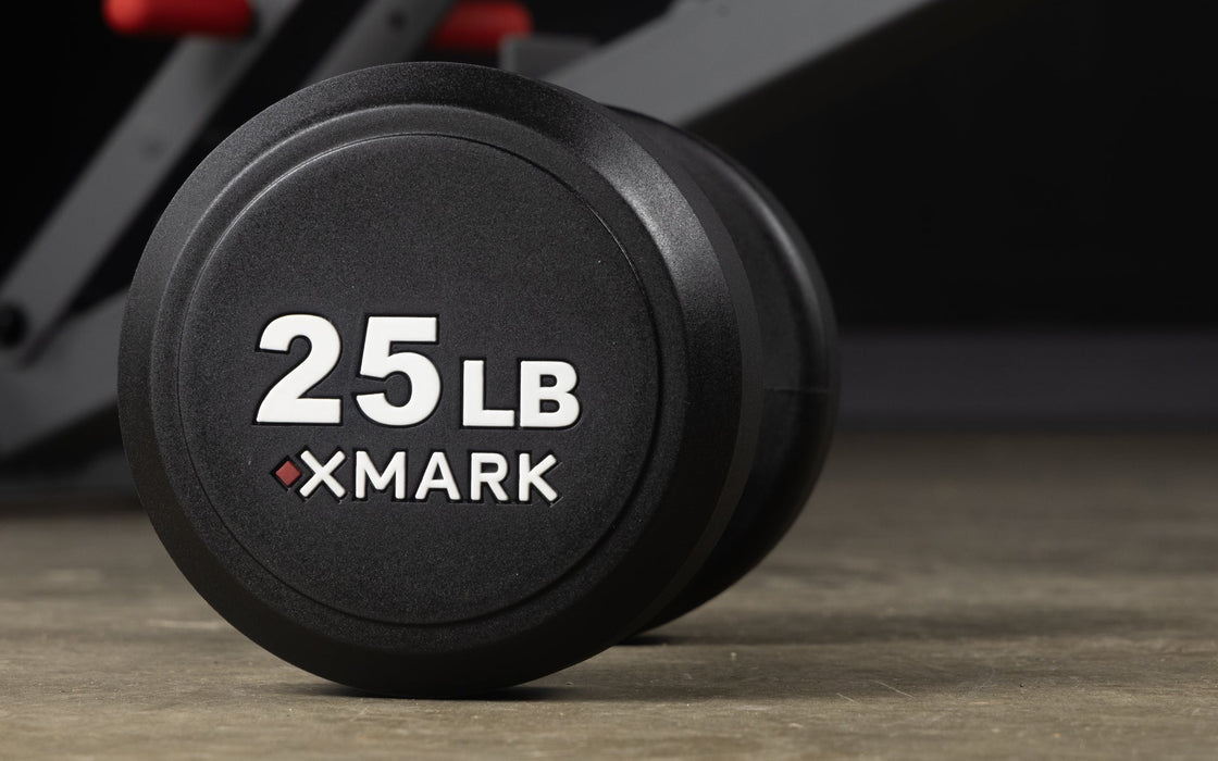 XMARK Round Commercial Urethane Dumbbells  (5-50 lb and 5-75 lb Sets) — in use demonstration
