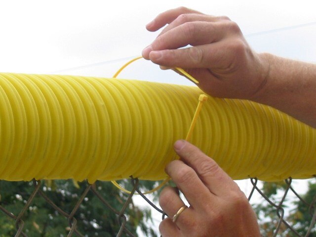 Trigon Sports 19" Yellow Zip Ties for Fence Crown — angle view