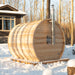 Elation barrel sauna in winter, shown with optional wood heater chimney