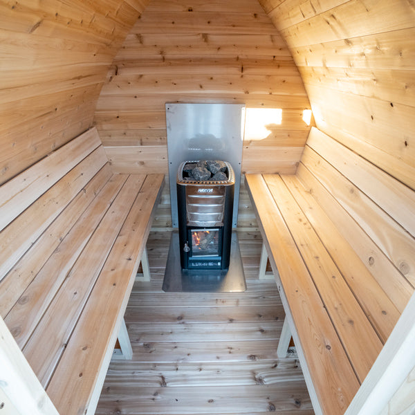 MiniPOD sauna interior benches, shown with optional heater