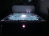 Liberty Spas LYS6000 6-person 240V hot tub lit at night