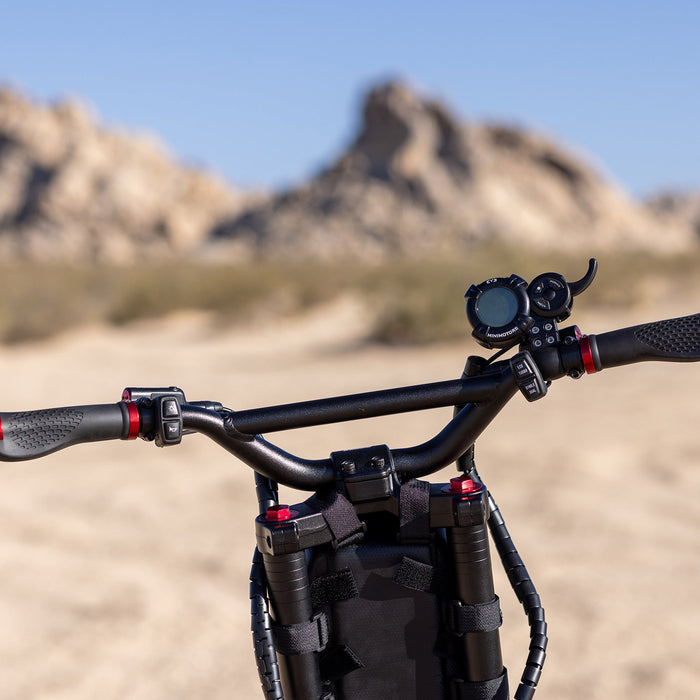 Kaabo Warrior 11 Pro+ handlebar setup with dual-motor controls, ergonomic grips, and performance display