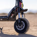 Close-up of Kaabo Warrior 11 Pro+ hydraulic front and rear suspension designed for off-road stability