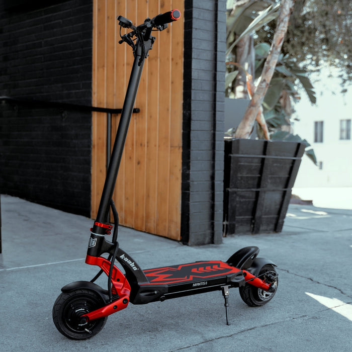 Kaabo Mantis 8 dual motor electric scooter side view with red suspension and compact urban design