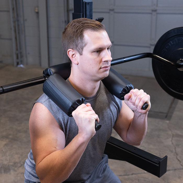 Body Solid Olympic Safety Squat Bar - OBSS50B — full setup angle