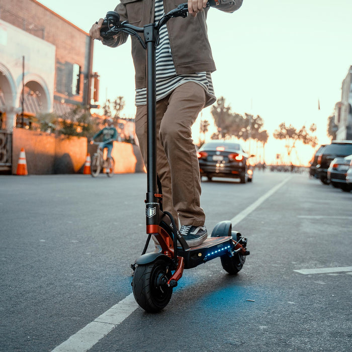 Kaabo Mantis 8 electric scooter being ridden in the city for daily commuting