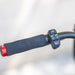 Kaabo Mantis 8 handlebar controls with throttle, lighting switch, and turn signals