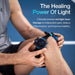 Man using the Kineon MOVE+ Pro red light laser therapy device on his knee for joint pain relief