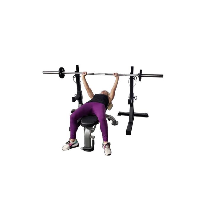 Paradigm SQST Portable Squat Stands with Spotters and J-Cups - model setting up for a bench press