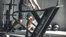 Grit Runner curved treadmill in a home gym